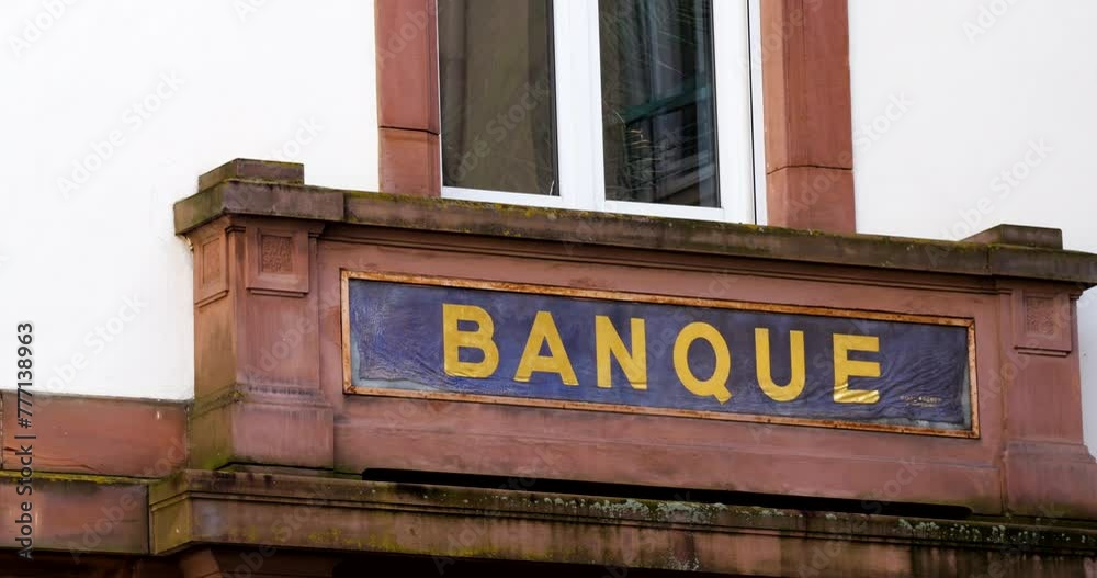A colorful, vibrant scene unfolds, capturing the charm of a vintage bank inscription on the weathered stone facade of an old building, radiating historical allure and cinematic nostalgia A colorful, vibrant scene unfolds, capturing the charm of a vintage bank inscription on the weathered stone facade of an old building, radiating historical allure and cinematic nostalgia