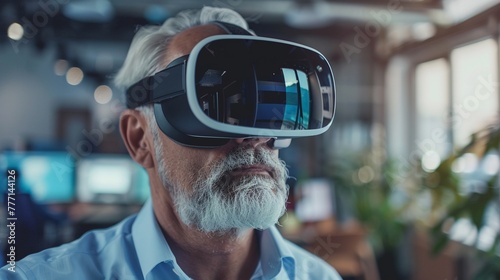 Mature Businessman Testing VR Experience with Development Team © Cyprien Fonseca