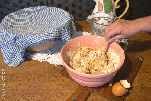 mixing  cake  ingredients  in an old-fashioned bowl 