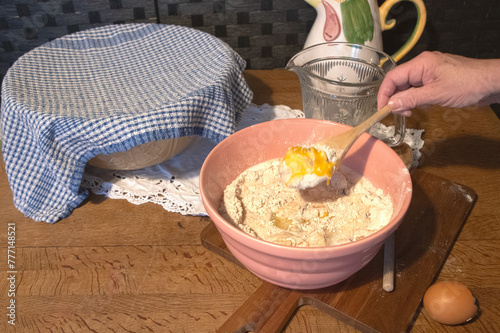 mixing  cake  ingredients  in an old-fashioned bowl 