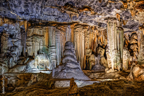 Dramatic wall with multiple stalactites in cave in the large underground limestone Cango Caves near Oudtshoorn, Western Cape South Africa