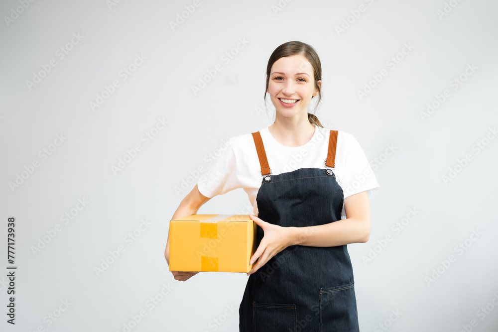 Caucasian woman smiling and holding package parcel box isolated on white background, Delivery and shipping service Caucasian woman smiling and holding package parcel box isolated on white background, Delivery and shipping service