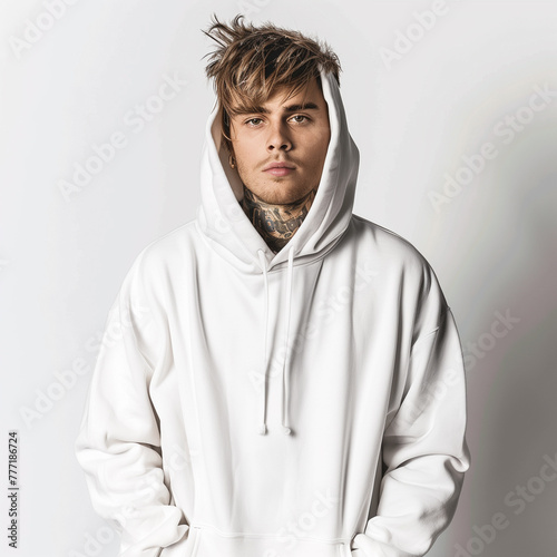 Handsome Boy in a trendy Fashion Pose in White Hoodie