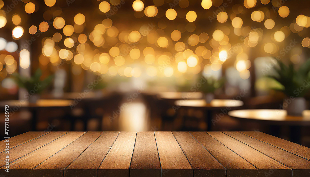 empty wood table top on blur light gold bokeh of cafe restaurant in dark background empty wood table top on blur light gold bokeh of cafe restaurant in dark background