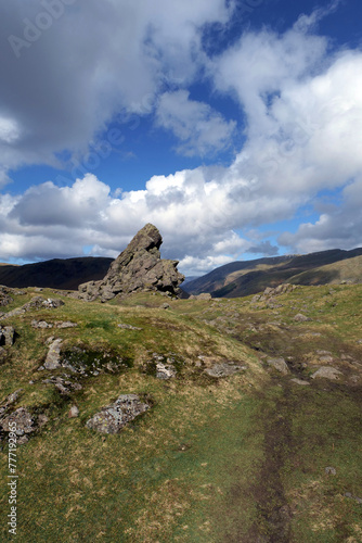 Well trodden path leads up to the Lion and Lamb rocky outcrop at the top of Helm Crag near Grasmere in the Lake District national park, UK. © Bennphoto