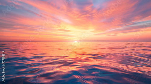 Stunning sunrise over a calm ocean  with vibrant hues of orange and pink.
