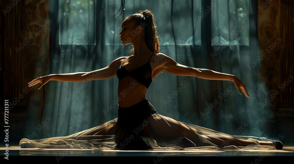 Solo dancer performing an arabesque, the graceful arch of her back ...