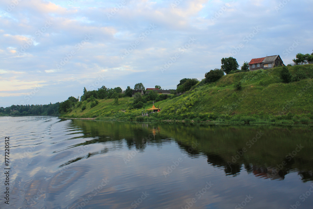 Photo, village on the riverbank. High quality photo
