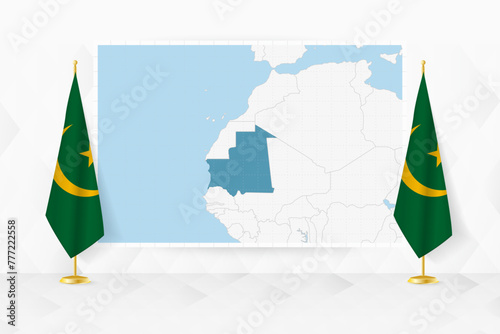 Map of Mauritania and flags of Mauritania on flag stand.