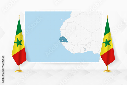 Map of Senegal and flags of Senegal on flag stand.
