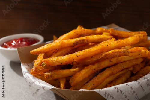 Obraz na plátně French Fries with Cajun Seasoning