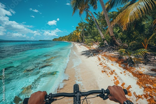 From a biker's perspective, riding on a serene white sand beach by the clear turquoise sea, surrounded by lush palm trees and vivid nature