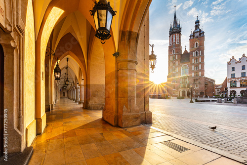 Cracow, Poland old town and St. Mary's Basilica seen from Cloth hall at sunrise