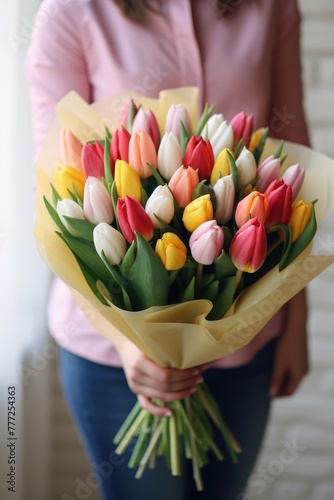 A large bouquet of tulips w...