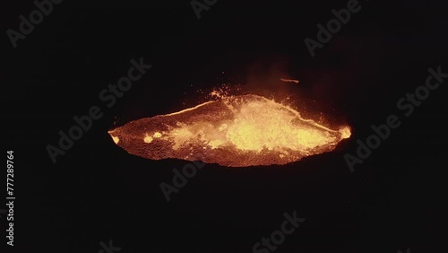 Aerial video of a volcanic eruption, lava and rivers, Litli Harut, Iceland photo