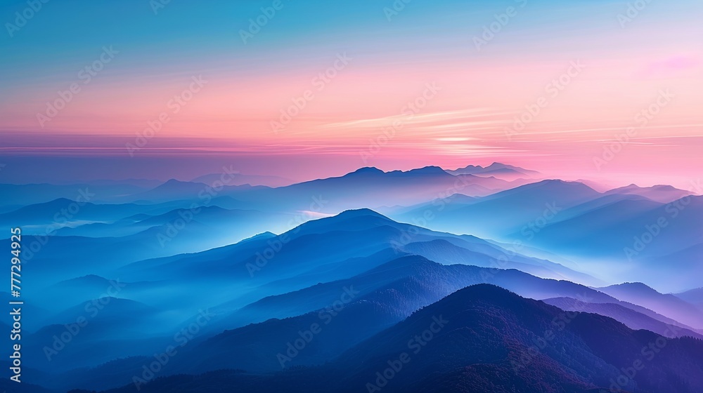 This image showcases a breathtaking mountain range at sunrise, with the colors of the sky reflected