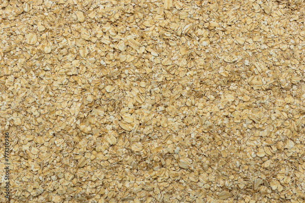 Rolled oat, oat flakes background or texture. Close up, directly above. Rolled oat, oat flakes background or texture. Close up, directly above.