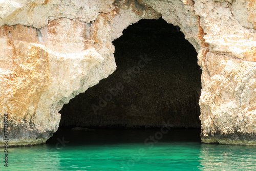 The famous Pirate Cave or Blue Cave on Asirli Island in the Gökkaya Bay close to Demre, Turkey photo