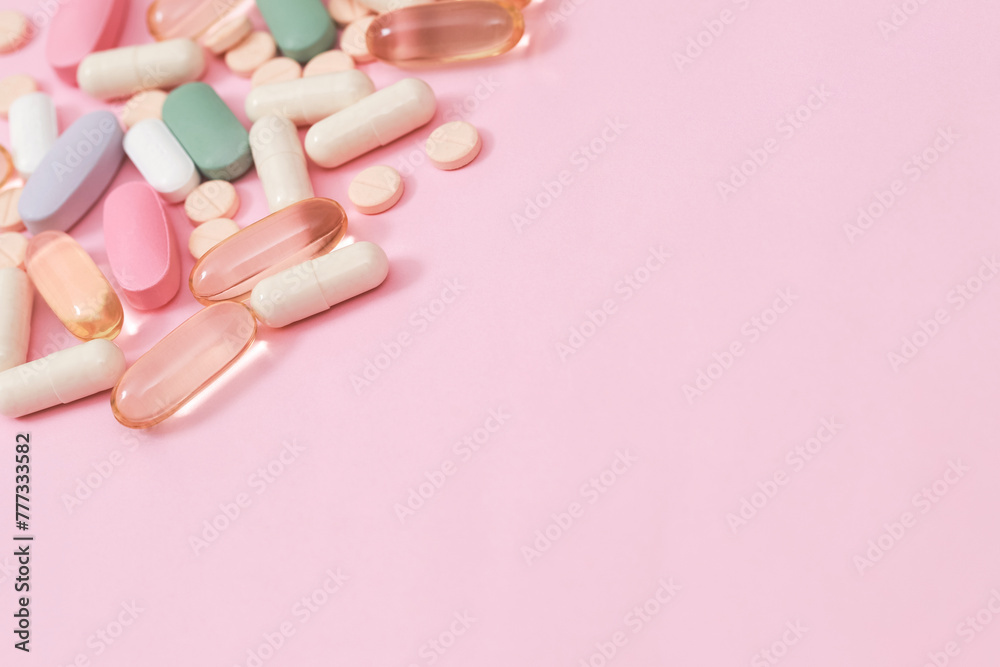 Pill bottle spilling out. colorful pills on to surface tablets Pill bottle spilling out. colorful pills on to surface tablets