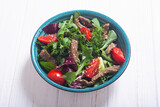 Healthy salad with beef cherry tomatoes