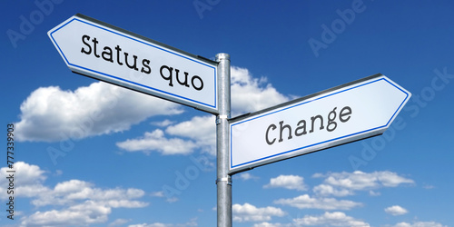 Status quo or change - metal signpost with two arrows photo
