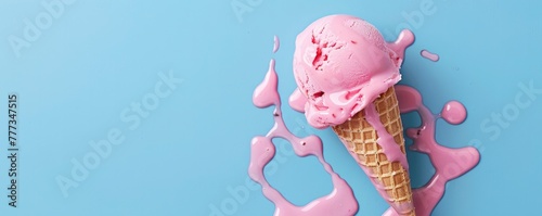 pink ice cream melting on blue background © Ahasanara