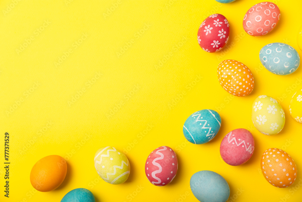 Easter eggs on a bright background. Easter celebration concept. Colorful easter handmade decorated Easter eggs. Place for text. Copy space.