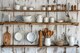 Kitchen utensils and dishware on wooden shelf. Kitchen organization.