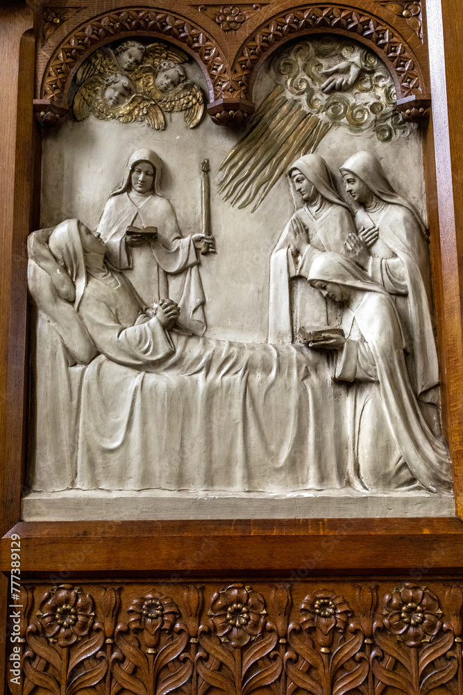 Notre Dame Immaculee catholic church, Brussels, Belgium. St. Therese relief