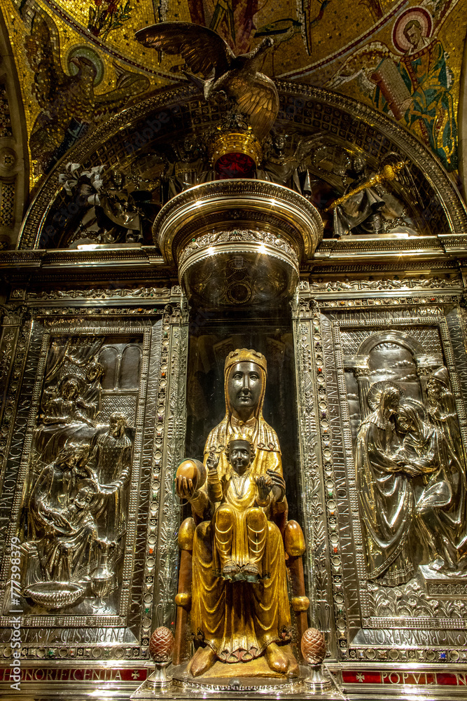 Montserrat monastery, Catalonia, Spain. Our Lady black madonna statue in the church sanctuary