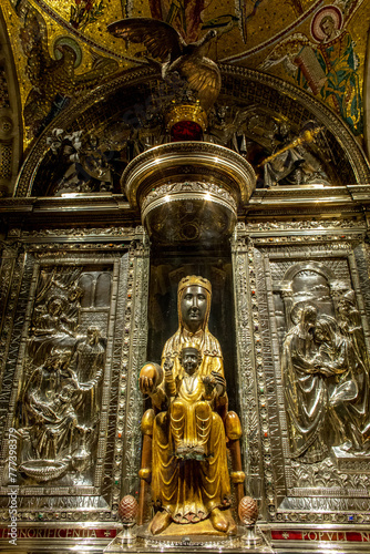 Montserrat monastery, Catalonia, Spain. Our Lady black madonna statue in the church sanctuary