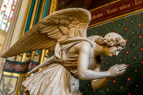 Saint Gervais-Saint Protais catholic church, Paris, France. Praying angel statue by sculpted by Jean-Pierre Cortot photo