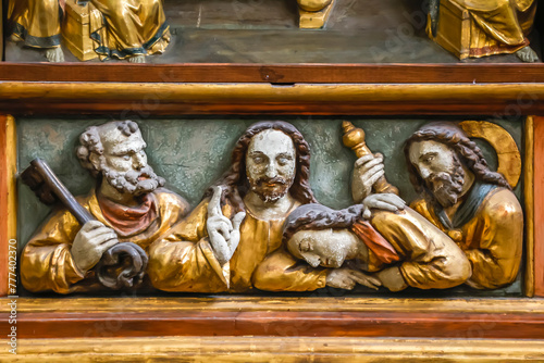 Saint PeterÕs cathedral, Beauvais, France. Detail of the Marissel Passion altarpiece in a side chapel depicting Jesus Christ with disciples before being caught by Roman soldiers photo