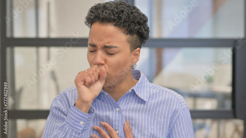 Portrait of Coughing Sick African Woman in Office