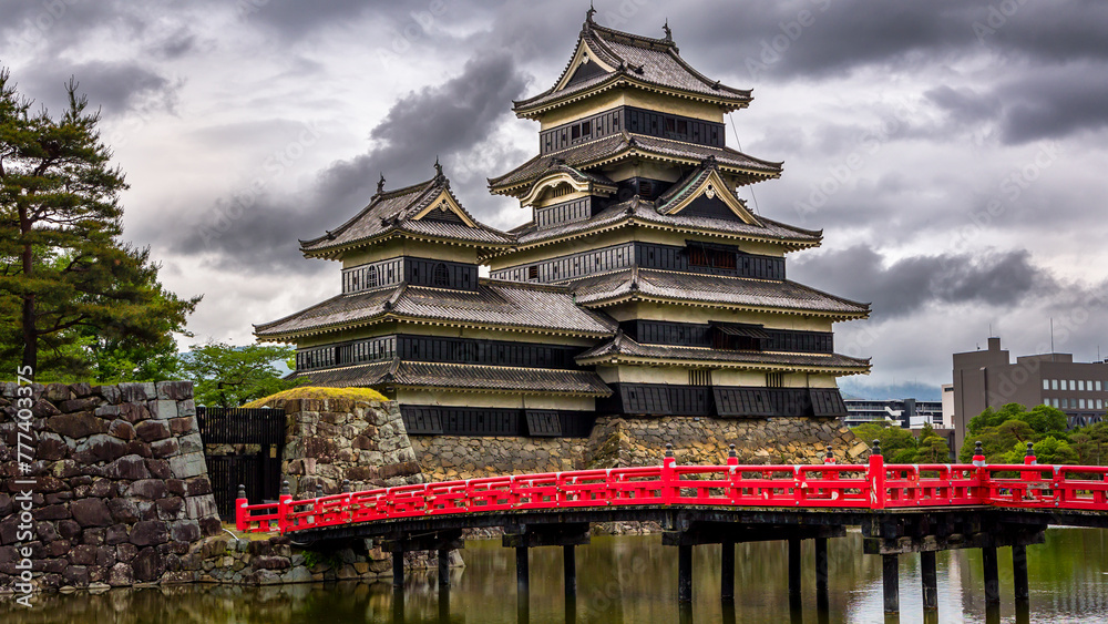 Red bridge in front of an ancient Japanese castle (Matsumoto, Nagano)