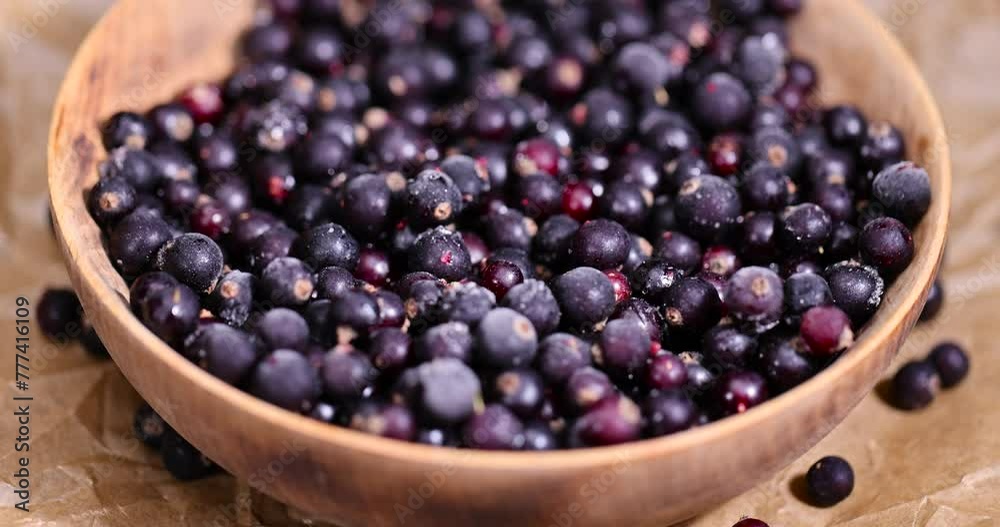 Frozen black currant berries close-up, fresh frozen currants for long-term storage Frozen black currant berries close-up, fresh frozen currants for long-term storage
