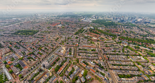 Amsterdam, Netherlands. Panorama of the city on a summer morning in cloudy weather. Aerial view
