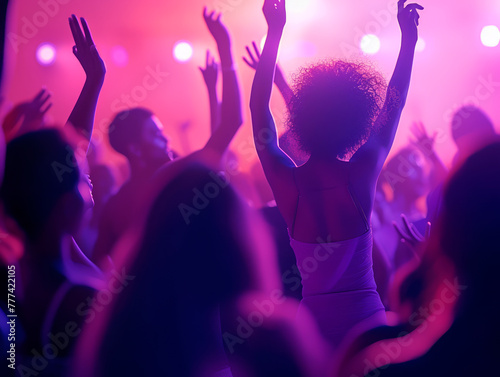 Silhouettes of people dancing at a concert with vibrant purple lighting in the background, depicting a lively party atmosphere, Generative AI. Generative AI
