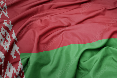 waving colorful national flag of belarus. © luzitanija