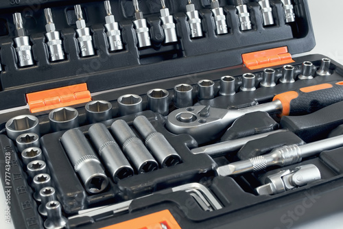 A manual set of tools for car repair and maintenance. Close-up, selective focus.
