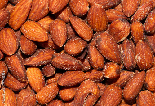 close up with many roasted and salted almonds
