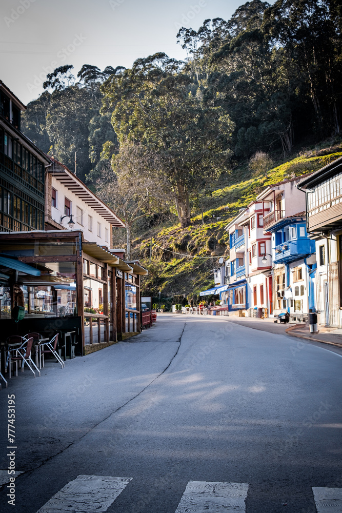 Scenic village road in Lastres, Asturias, offering a blend of cultural charm and natural beauty.