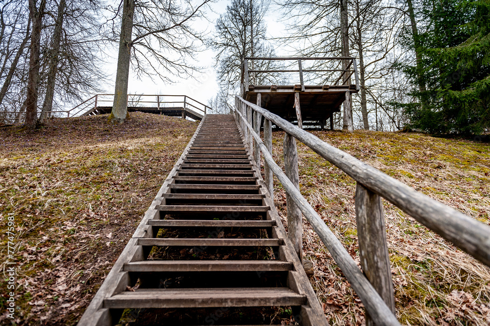 Wooden staircase leading to the top of the hill. Vilce Nature Park, Latvia. Wooden staircase leading to the top of the hill. Vilce Nature Park, Latvia.