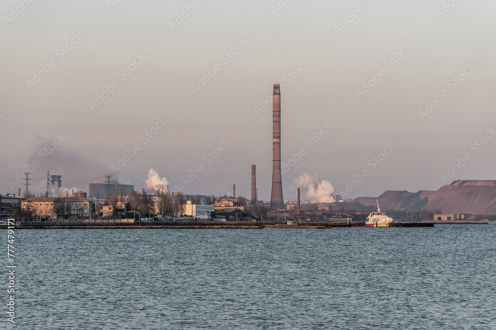 Factory with air pollution smoke from chimneys, environmental problems. Industry air pollution concept. Ecological catastrophe.