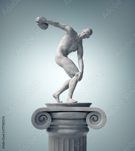 Greek athlete statue throwing the discus. photo