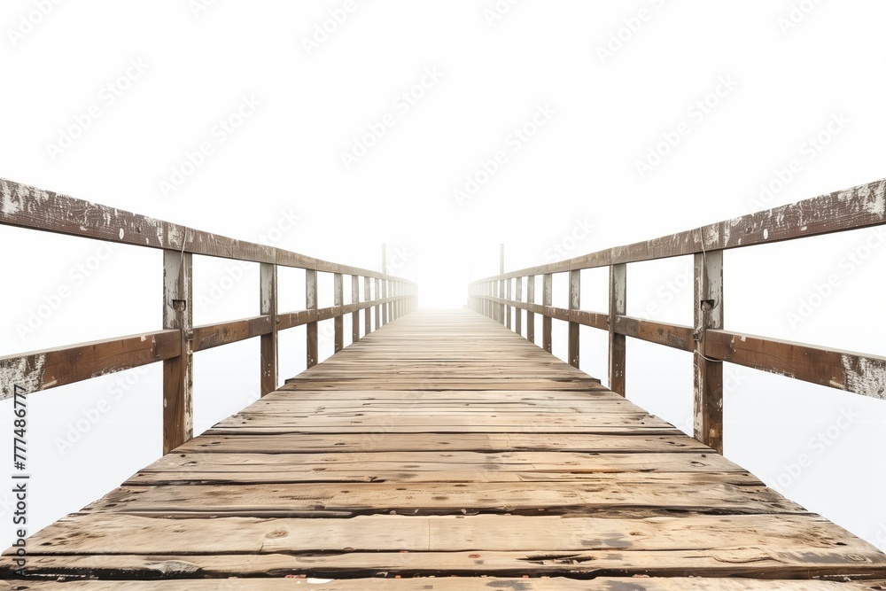 Old wooden jetty stretching out to foggy null