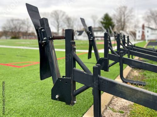 Canvas-taulu Football blocking sled on a grass turf sports field