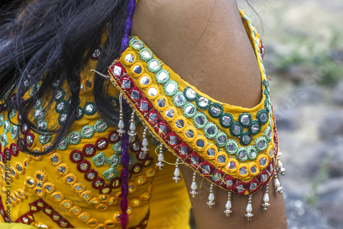 Detail of a womanâ€™s dress in Daulatabad, Maharashtra, India photo