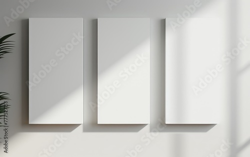Three empty picture frames in sunlight
