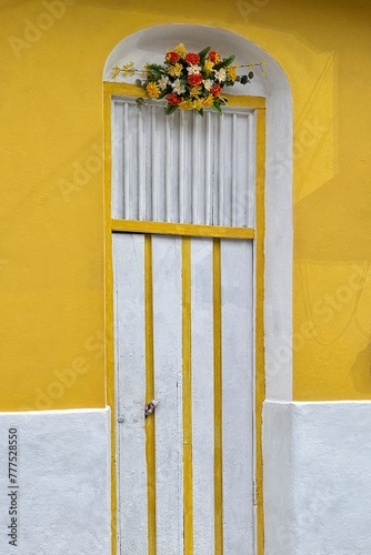 Beautiful decorated door of a house in Flores Island in Guatemala